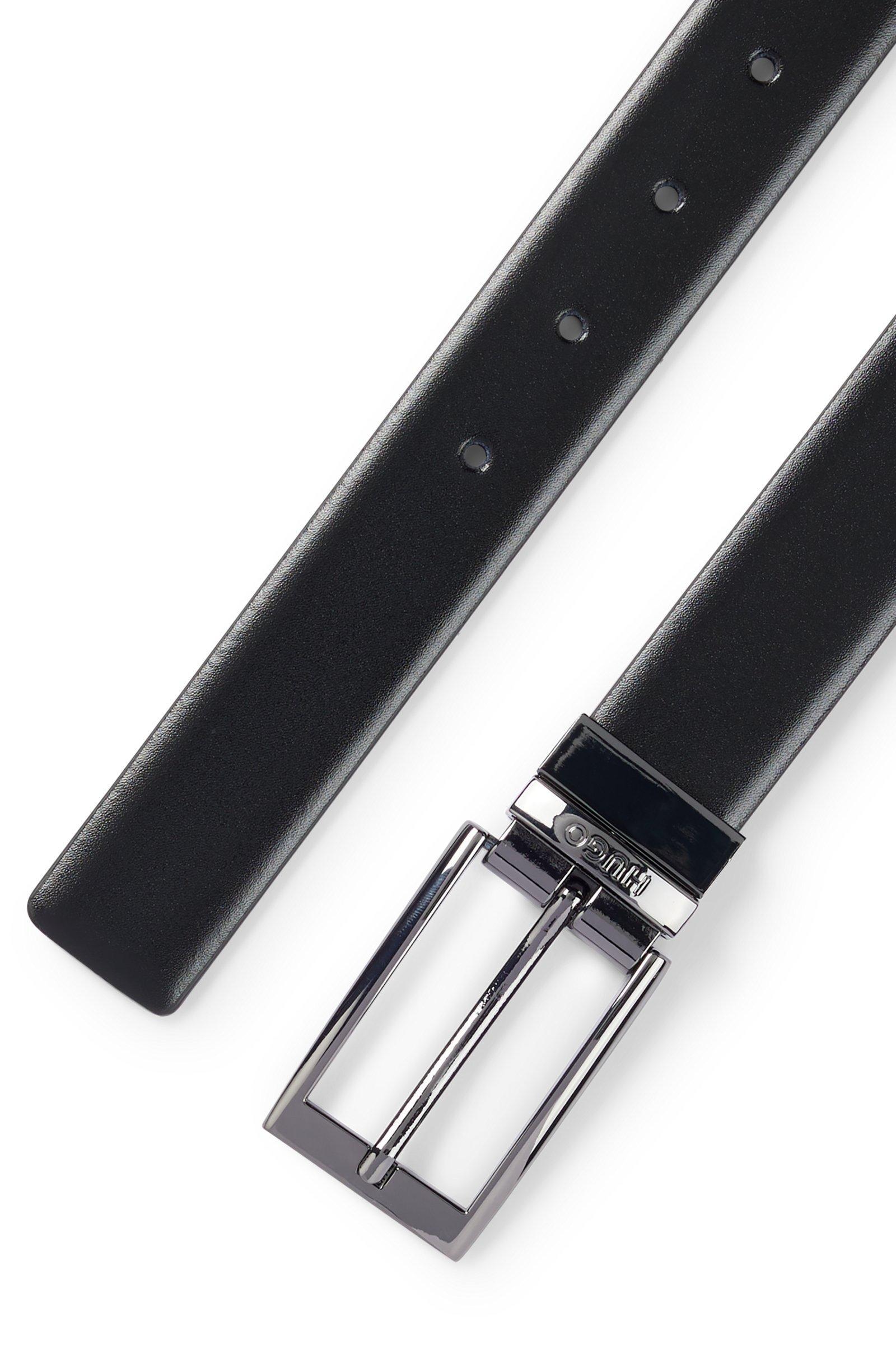 Cintura HUGO Boss Elvio pelle Nera reversibile alta 3 cm realizzata in Italia in pregiata pelle con passante in metallo brandizzato.