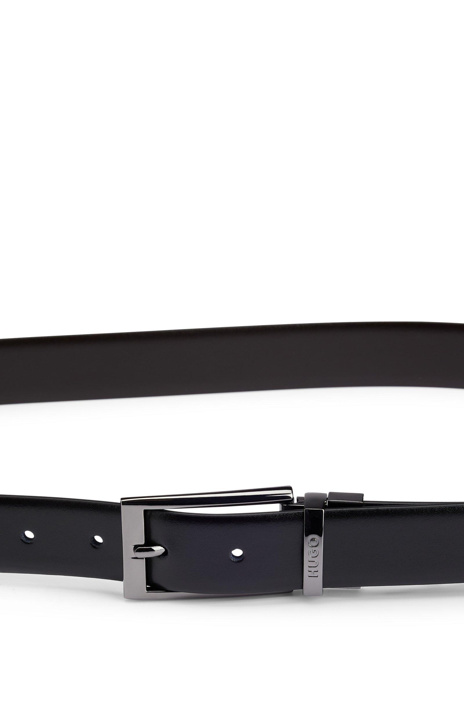 Cintura HUGO Boss Elvio pelle Nera reversibile alta 3 cm realizzata in Italia in pregiata pelle con passante in metallo brandizzato.