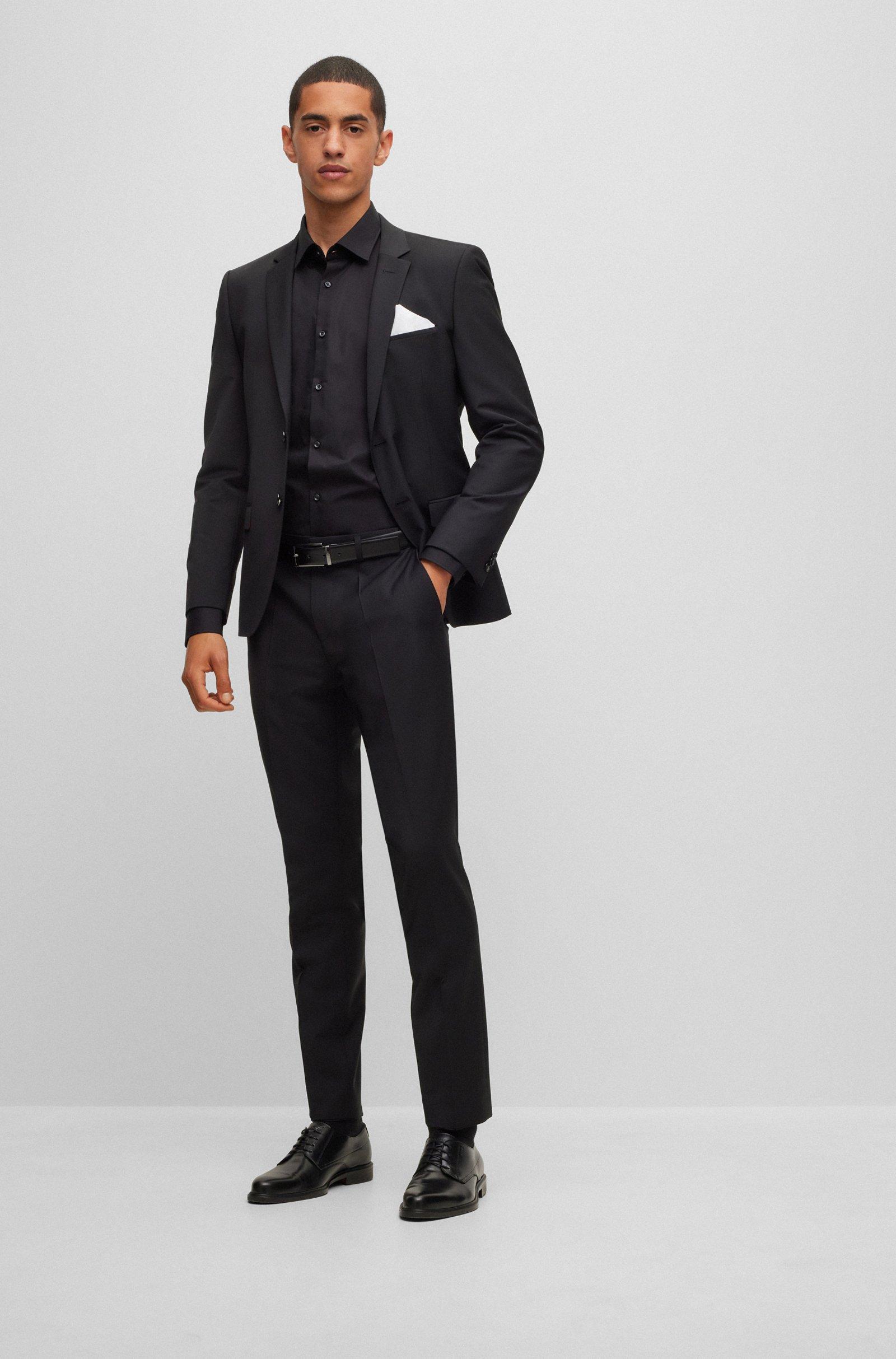 Cintura HUGO Boss Elvio pelle Nera reversibile alta 3 cm realizzata in Italia in pregiata pelle con passante in metallo brandizzato.