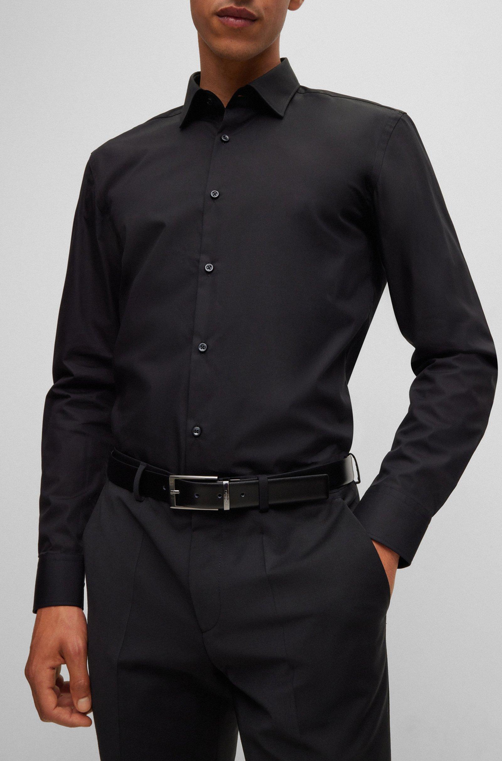 Cintura HUGO Boss Elvio pelle Nera reversibile alta 3 cm realizzata in Italia in pregiata pelle con passante in metallo brandizzato.