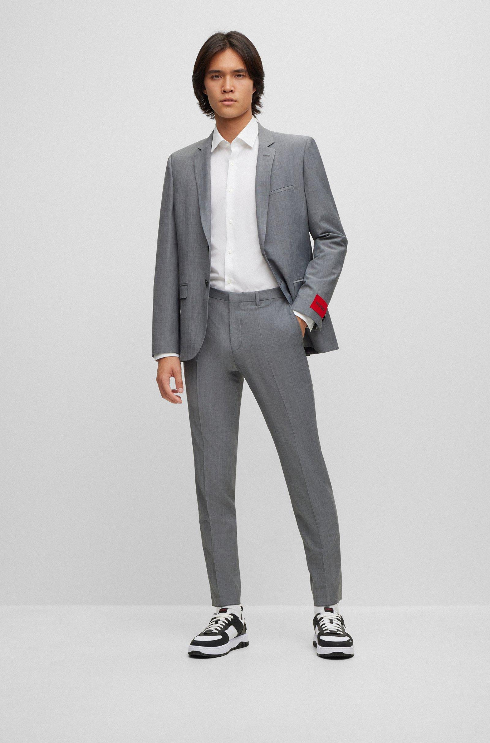 Camicia HUGO Boss Bianca , manica lunga. Tessuto in cotone Popeline molto gradevole e morbido sulla pelle ,ottimo per una facile stiratura