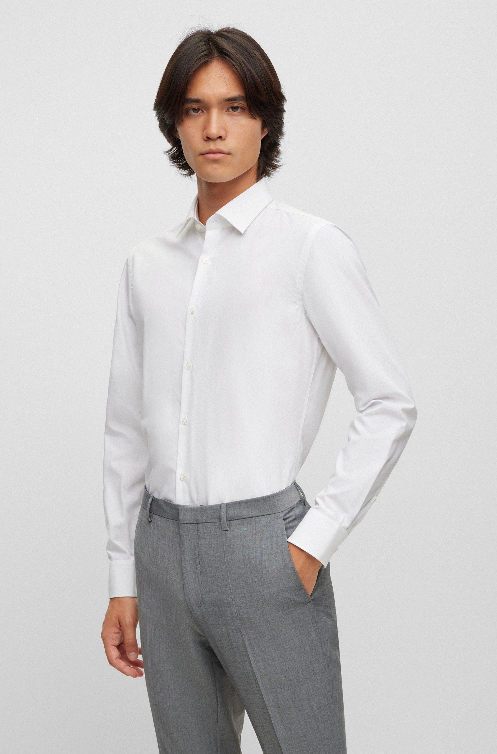 Camicia HUGO Boss Bianca , manica lunga. Tessuto in cotone Popeline molto gradevole e morbido sulla pelle ,ottimo per una facile stiratura