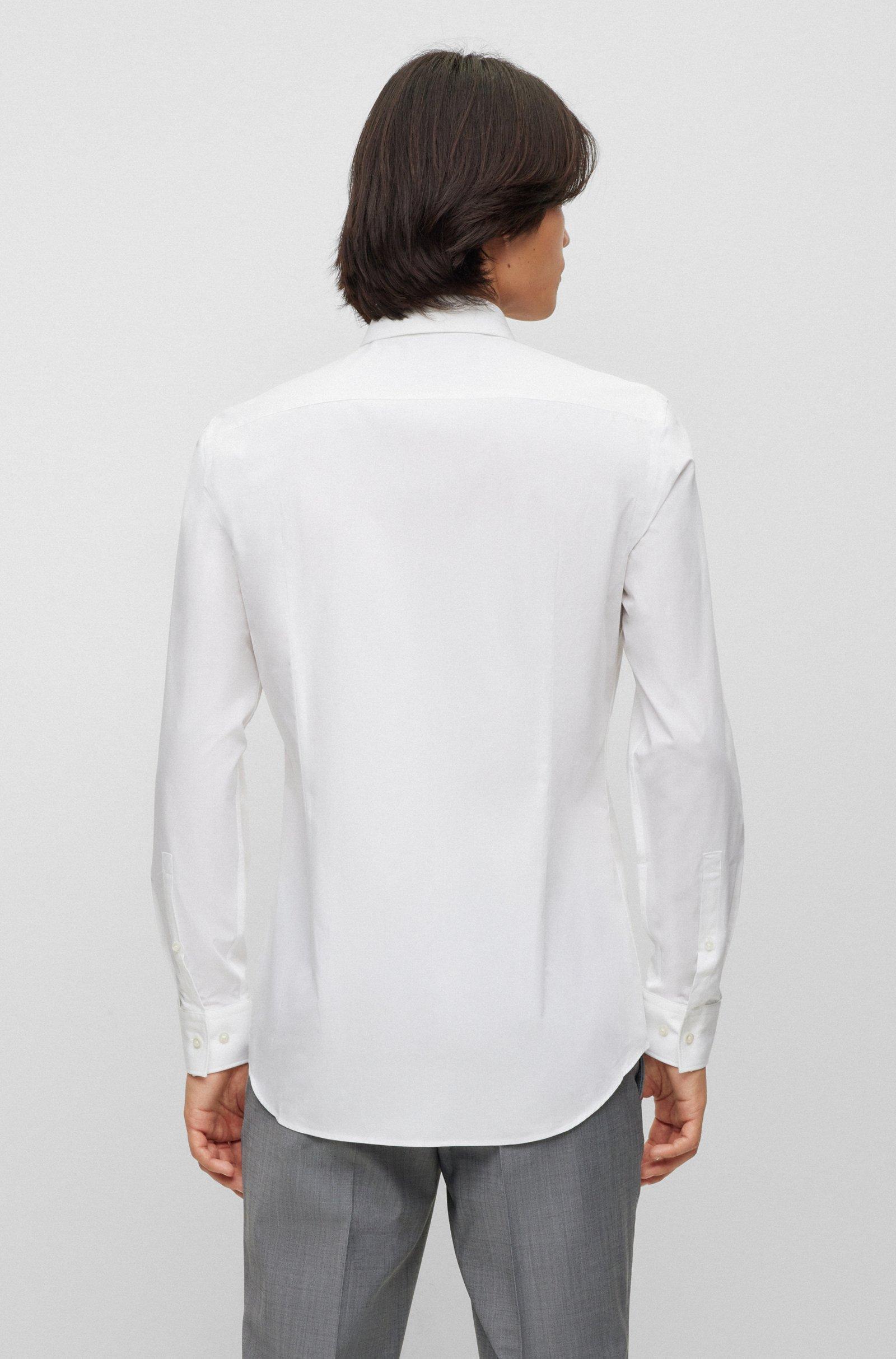 Camicia HUGO Boss Bianca , manica lunga. Tessuto in cotone Popeline molto gradevole e morbido sulla pelle ,ottimo per una facile stiratura